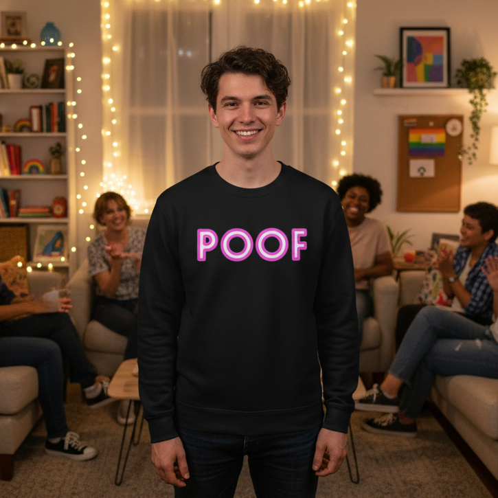 Smiling person modeling a black sweatshirt with pink outlined “POOF” lettering at a cozy gathering
