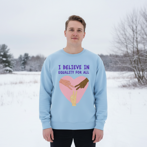 Person wearing a light blue sweatshirt in a snowy field, with a pink heart and three hands graphic