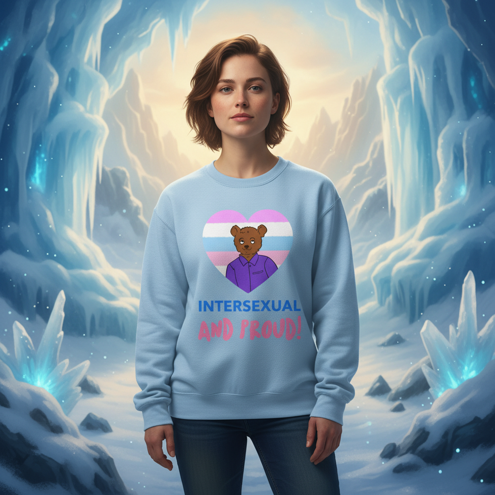 Front-facing person wearing a light blue sweatshirt reading “INTERSEXUAL AND PROUD!”