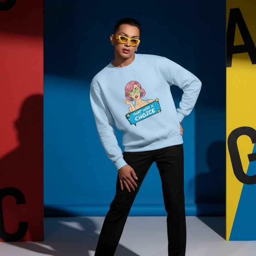 Person wearing the That Was A Choice unisex sweatshirt, featuring a pop-art illustration, paired with black trousers and yellow cat-eye sunglasses, embodying vibrant queer pride and self-expression.