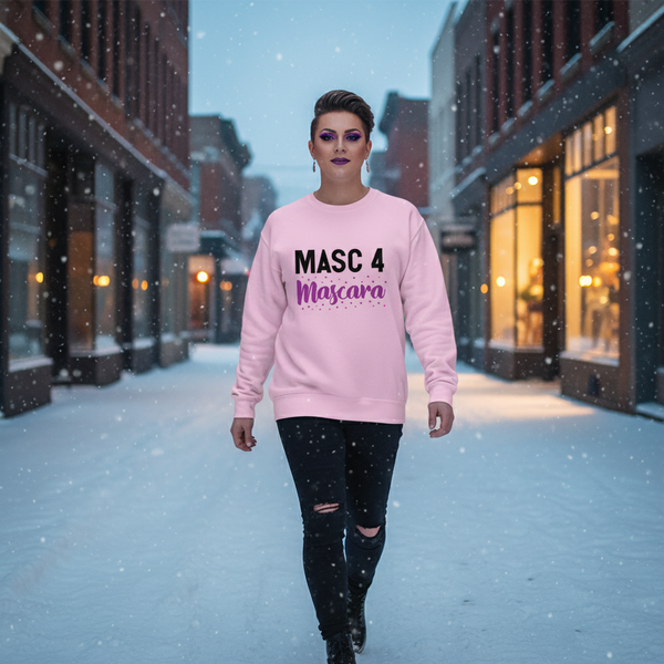Model wearing a pink sweatshirt reading “MASC 4 Mascara” while walking in falling snow