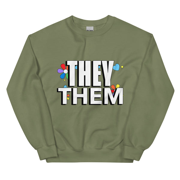 Unisex olive green crewneck sweatshirt with “They / Them” in bold white text, plus small colorful flowers and hearts for queer flair.