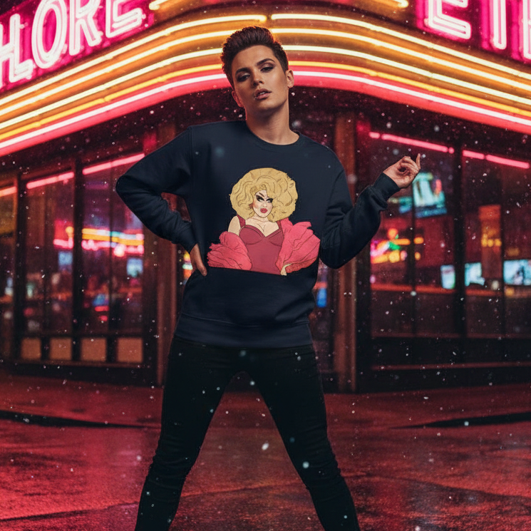 Sassy Trixie Mattel Unisex Sweatshirt features a bold cartoon drag queen illustration, worn by a confident person on a neon-lit street, embodying queer pride, empowerment, and self-expression.