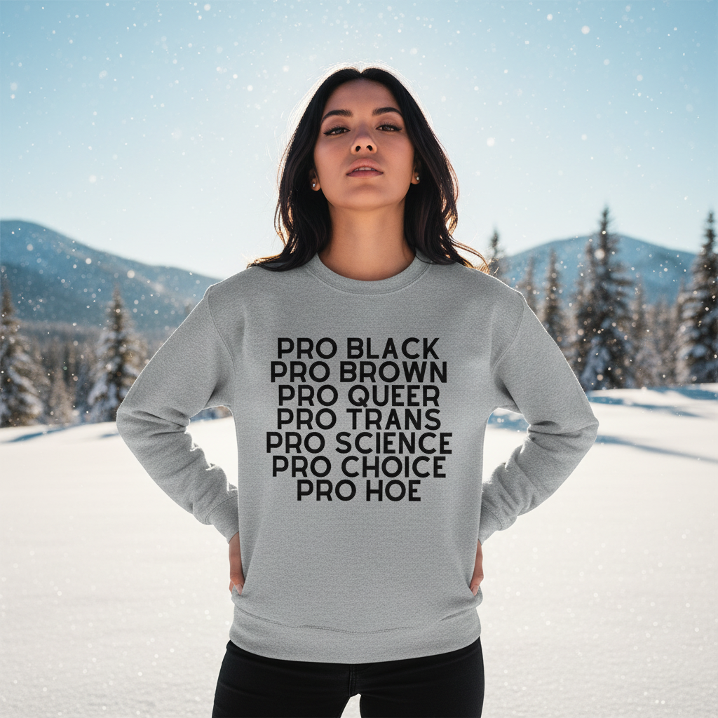 Model wearing a gray sweatshirt reading “PRO BLACK PRO BROWN PRO QUEER PRO TRANS PRO SCIENCE PRO CHOICE PRO HOE”