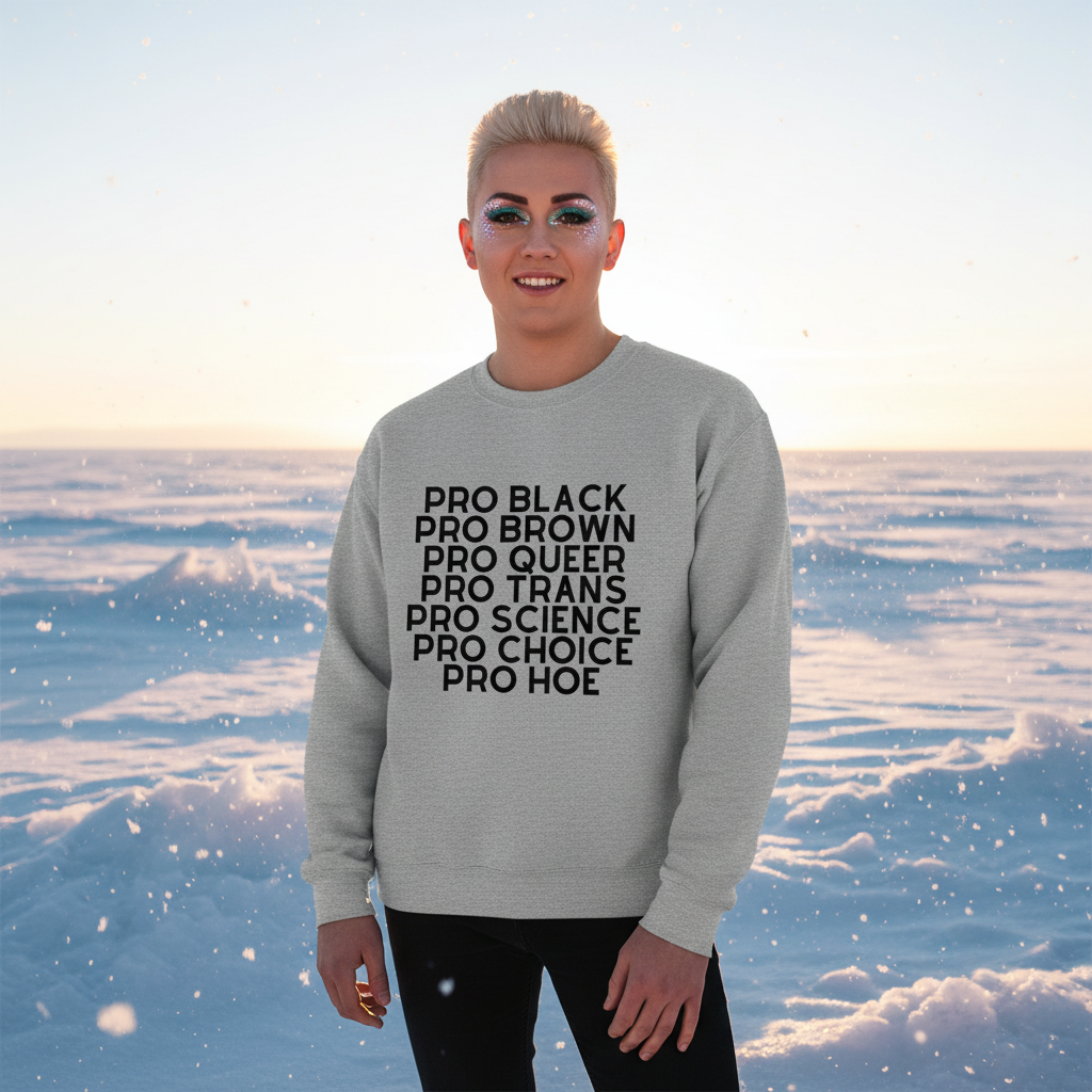 Person in snowy landscape wearing the Pro Hoe Unisex Sweatshirt, featuring bold black affirmations supporting queer identities. Celebrates LGBTQ pride with empowering, inclusive self-expression, perfect for warmth and visibility.