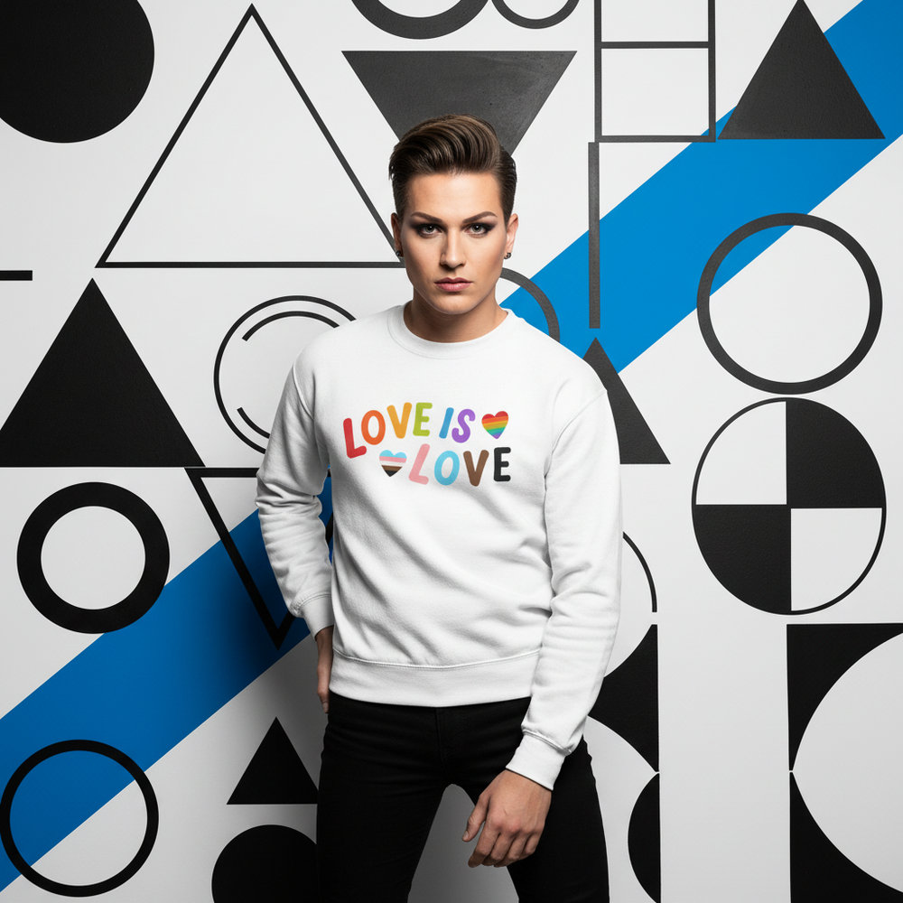 Front-facing model in a white sweatshirt reading “LOVE IS LOVE” with rainbow hearts