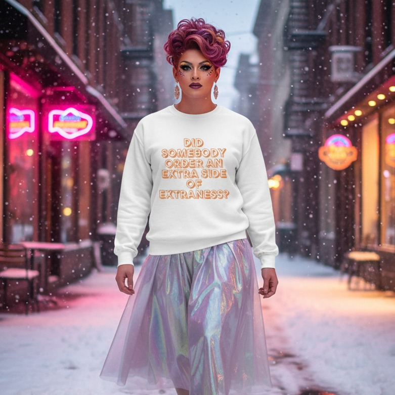 Person in vibrant drag on a snowy street wears the Extra Side of Extraness Unisex Sweatshirt, paired with an iridescent midi-skirt, celebrating LGBTQIA+ pride with bold makeup and statement earrings.
