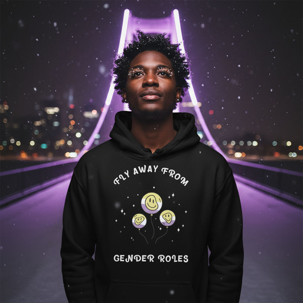 Front-facing model wears a black hoodie reading “FLY AWAY FROM GENDER ROLES” with three smiley balloons.