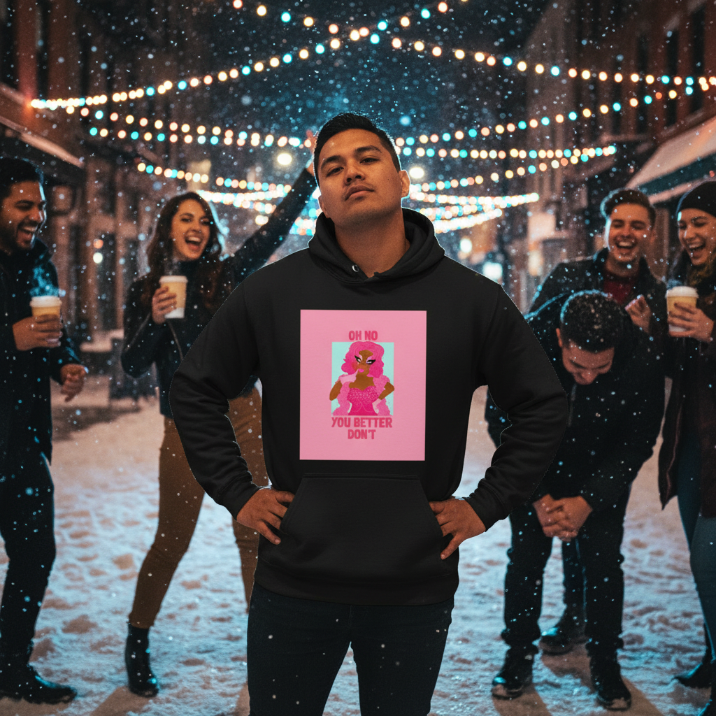Young man exudes confidence in the Oh No You Better Don't Unisex Hoodie, surrounded by friends under festive lights. Embrace empowerment and self-expression with this cozy, inclusive, and stylish piece.