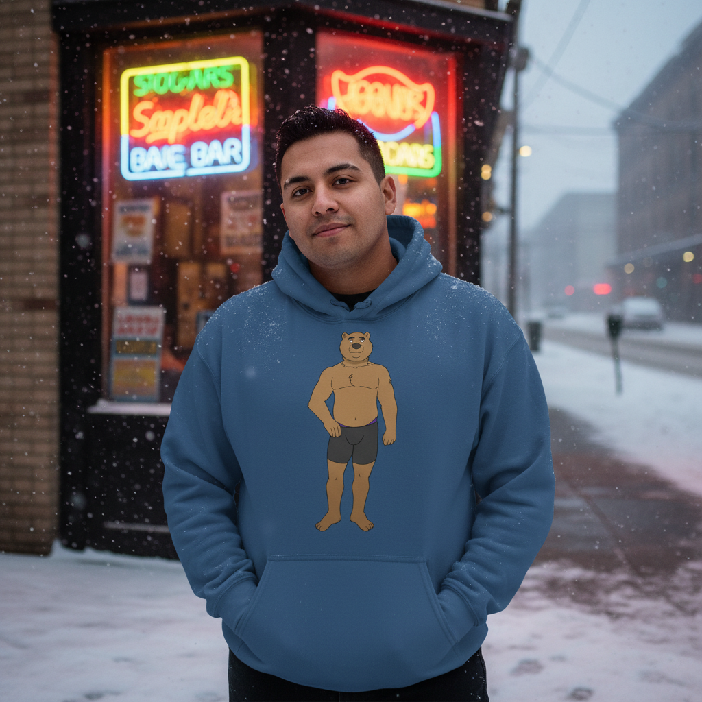 Person wearing a blue hoodie with a cartoon bear in underwear, standing in falling snow