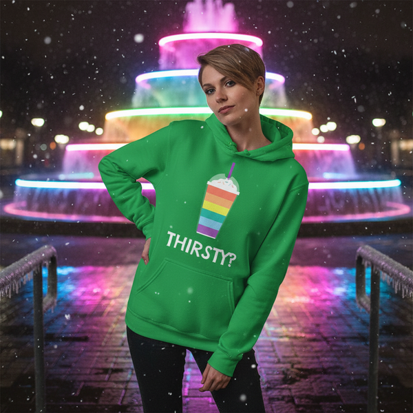 Green hoodie with rainbow popsicle graphic and “THIRSTY?” text, worn in front of neon lights
