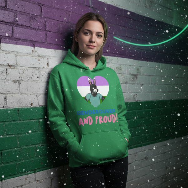 Person wearing a green hoodie with a rabbit heart graphic and “Genderqueer and Proud!” text