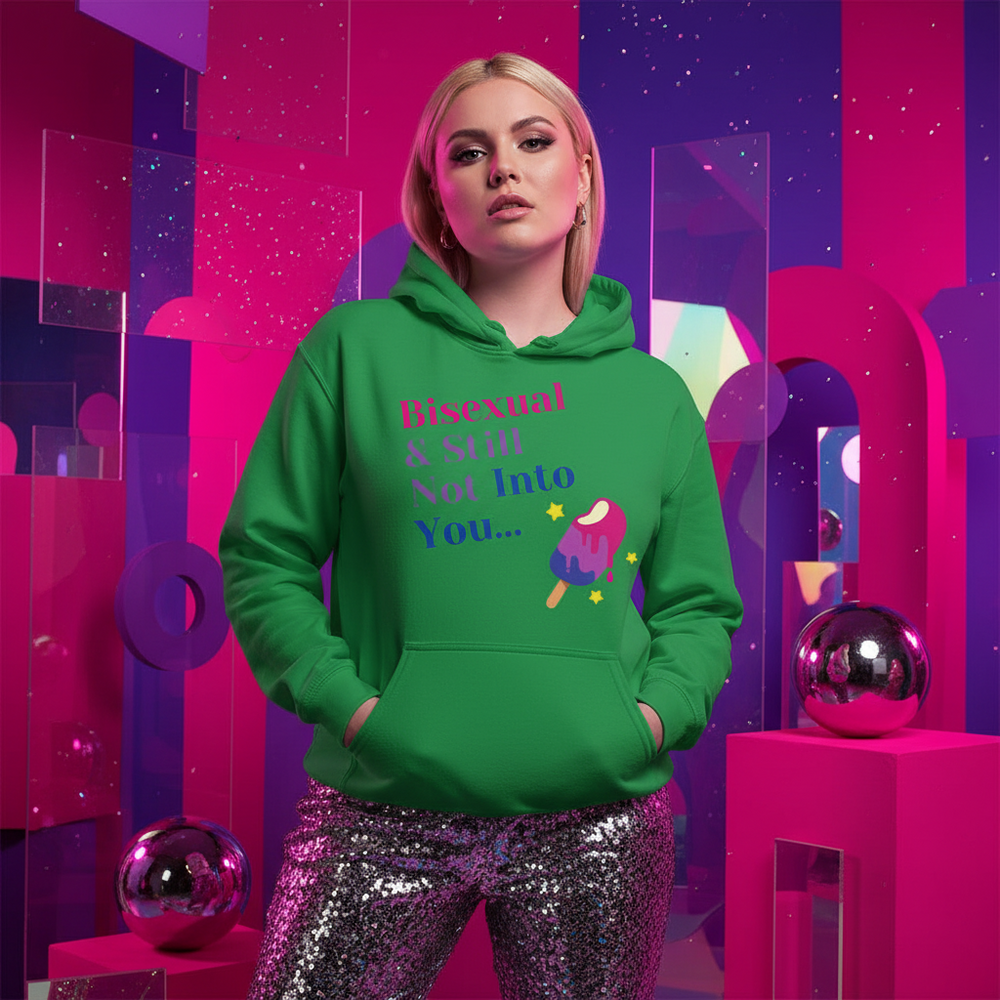 Model wearing a green hoodie reading “Bisexual & Still Not Into You...” with a popsicle graphic