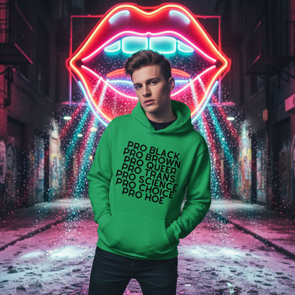 Model wearing a green hoodie reading “PRO BLACK PRO BROWN PRO QUEER PRO TRANS PRO SCIENCE PRO CHOICE PRO HOE”