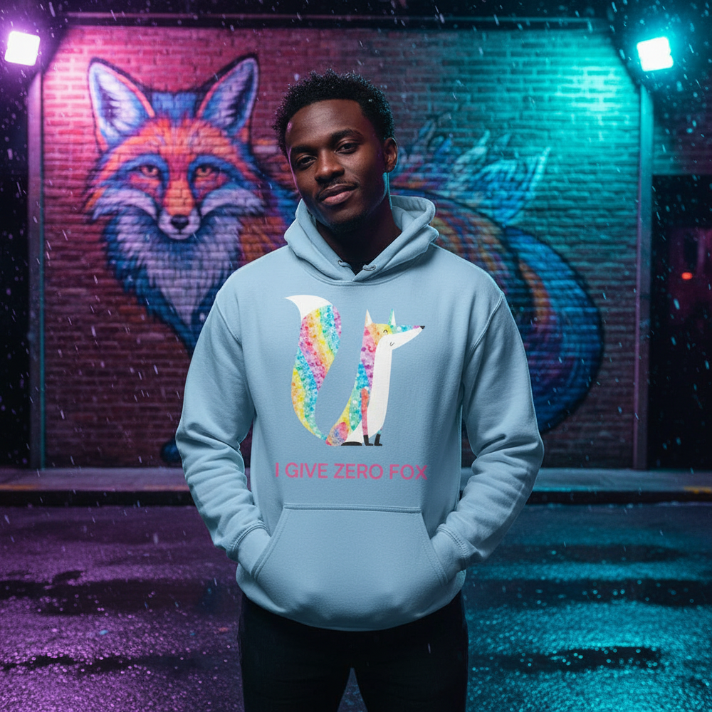 Front-facing person in a light blue hoodie with a colorful fox graphic and “I GIVE ZERO FOX” text