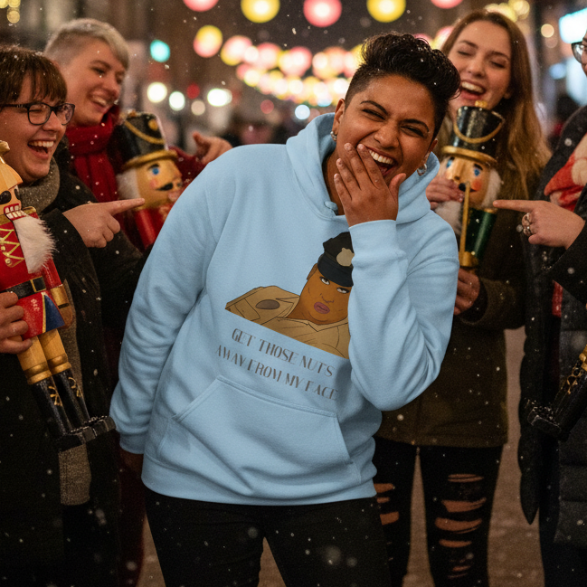 Friends delight in the Get Those Nuts Away From My Face! (Latrice Royale) Unisex Hoodie, featuring a playful police hat design. This cozy, inclusive hoodie embodies queer pride and self-expression amid festive evening cheer.