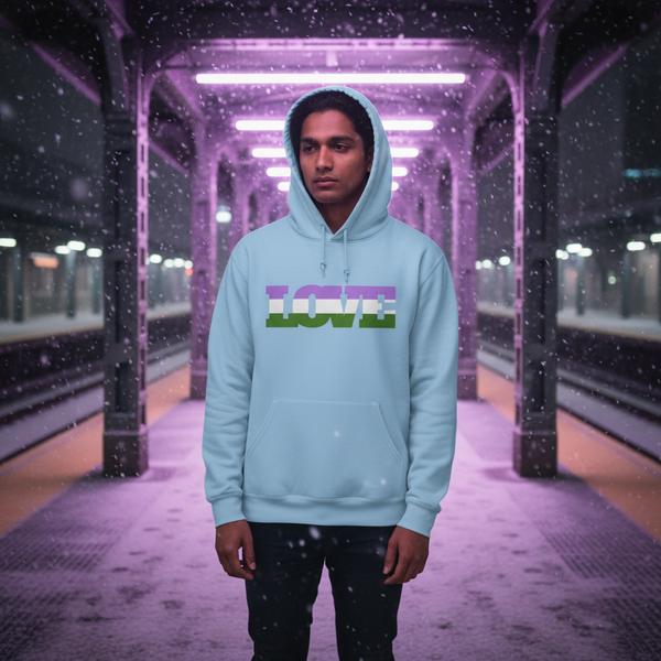 Front-facing model in a light blue hoodie with a multicolor “LOVE” graphic on a snowy train platform