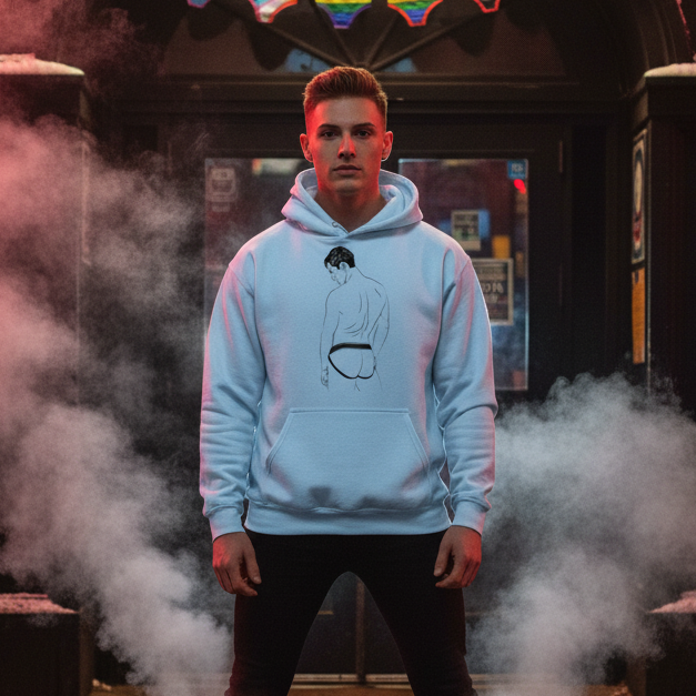 Young man in an urban nighttime setting wearing the Jockstrap Unisex Hoodie with a line-drawing design. Showcases pride and self-expression, perfect for cooler evenings, embodying queer empowerment and style.