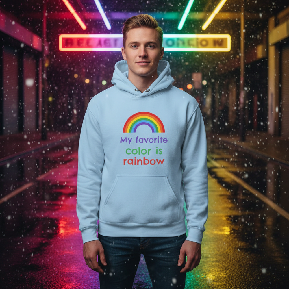 Model wearing a light blue hoodie with a rainbow and “My favorite color is rainbow” text