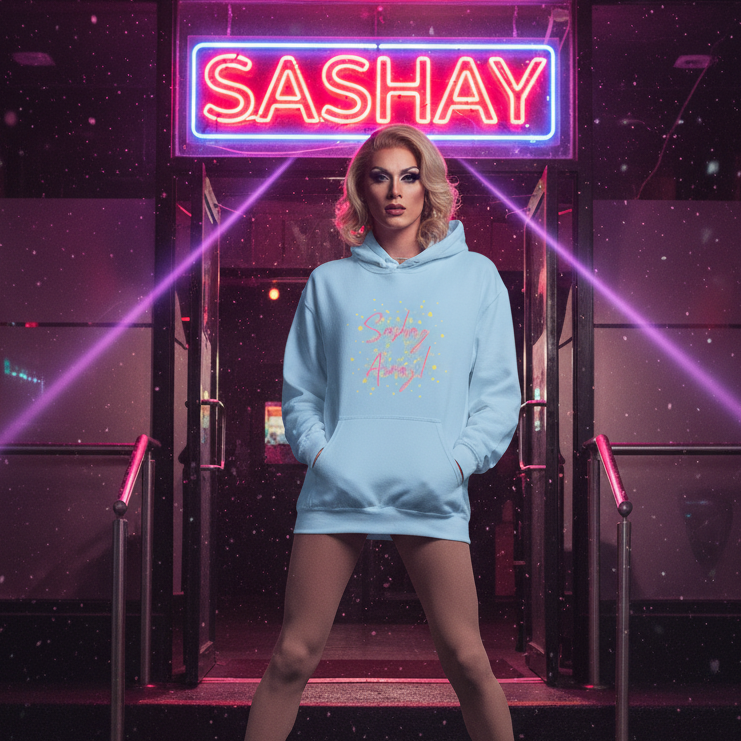 Drag performer in a Sashay Away Unisex Hoodie at a club entrance, embodying queer pride with a pastel-blue oversized hoodie, sheer tights, and dramatic makeup, under vibrant neon lights.