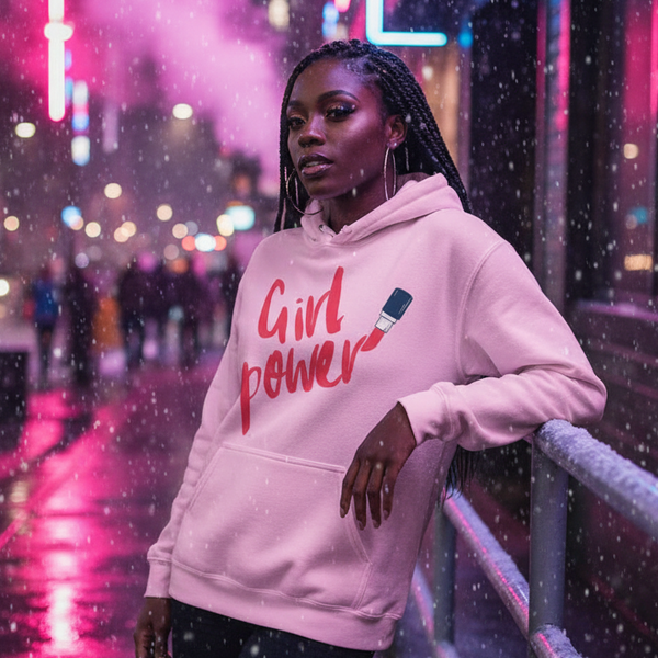 Person wearing a pink “Girl Power” hoodie with a lipstick graphic in a rainy neon-lit street