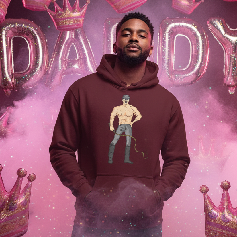 Model wearing a burgundy hoodie with a leather-clad cartoon person holding a leash graphic