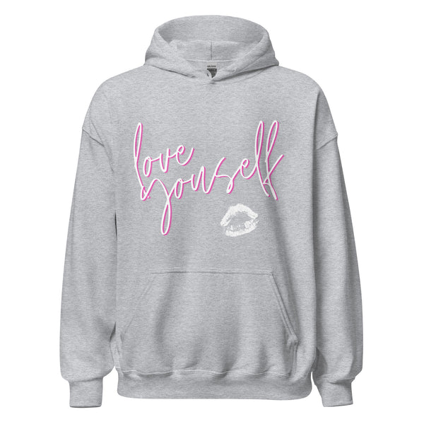 Unisex light gray hoodie with “love yourself” in bold pink cursive, white lip print, front pocket, no drawstrings—queer cozy vibes.