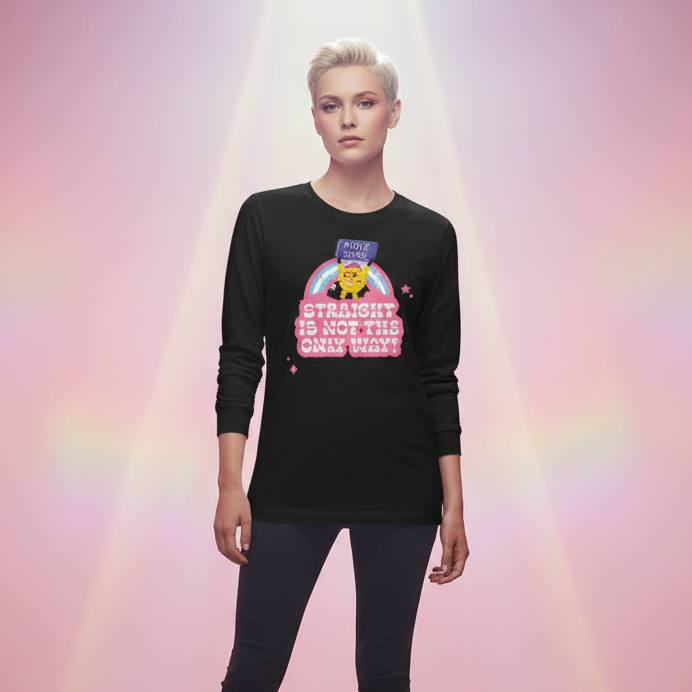 Person wearing a Straight Is Not The Only Way! Unisex Long Sleeve T-Shirt with a cartoon cat and rainbow print, embodying bold, queer pride and self-expression against a soft background.