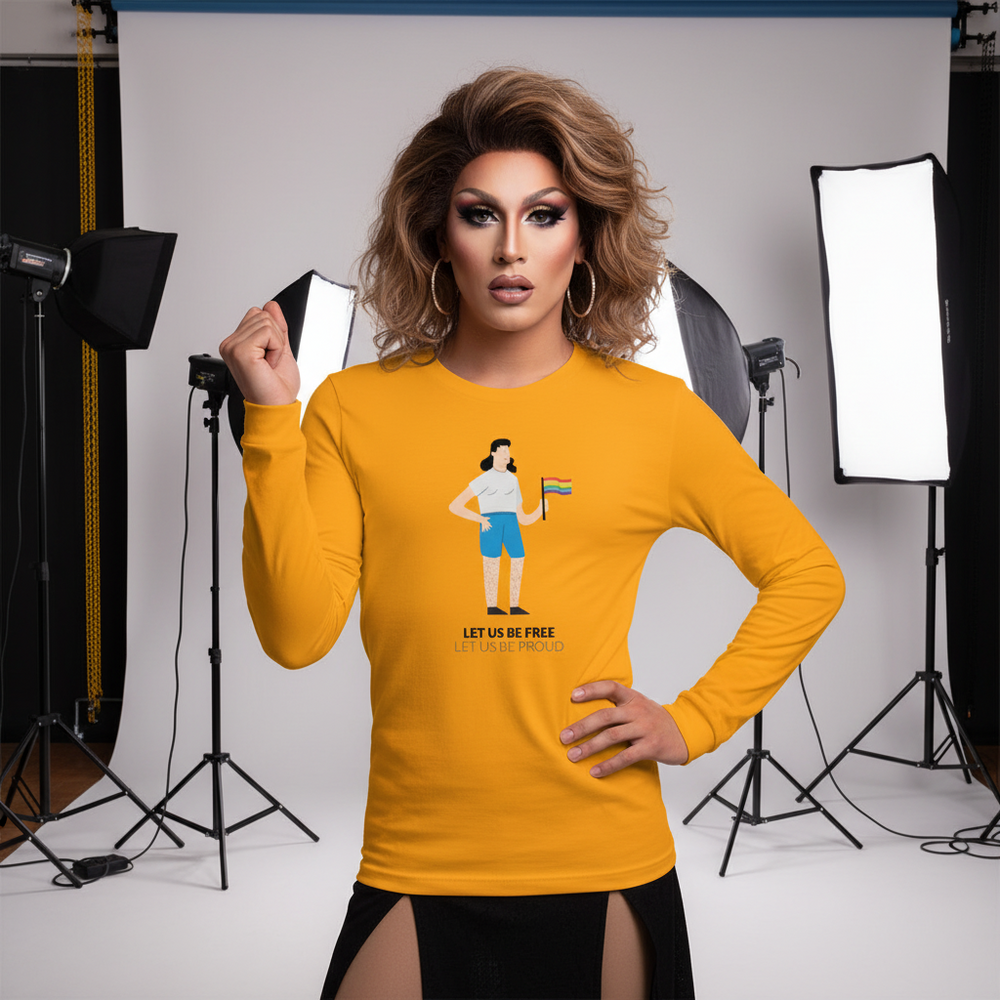 Model wearing a mustard long-sleeve shirt with a pride flag figure and “LET US BE FREE” text