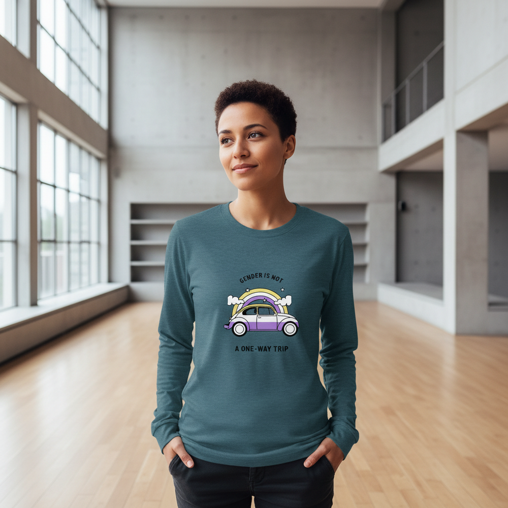 Unisex long sleeve tee with "Gender is not a one-way trip" slogan and cartoon car, worn by person with short curly hair.