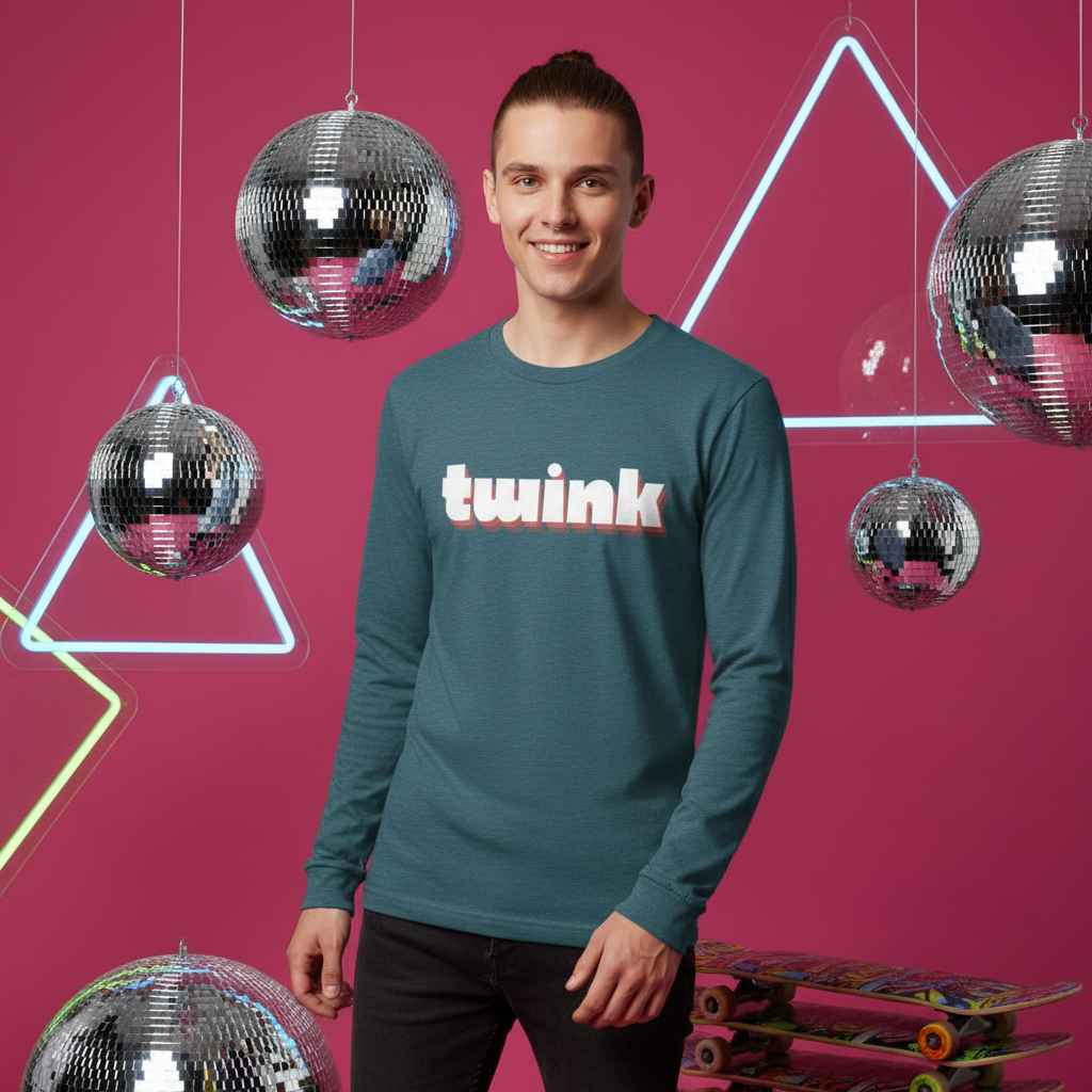 Young man in a teal-blue Twink Unisex Long Sleeve T-Shirt, surrounded by disco balls and neon shapes, exuding vibrant queer pride and self-expression.