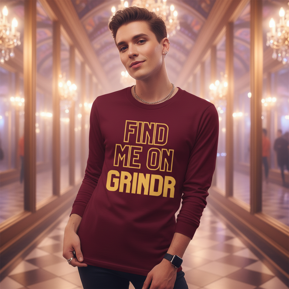 Unisex long sleeve tee, maroon with bold yellow "FIND ME ON GRINDR" slogan; queer man poses in chandelier-lit mirrored hall.