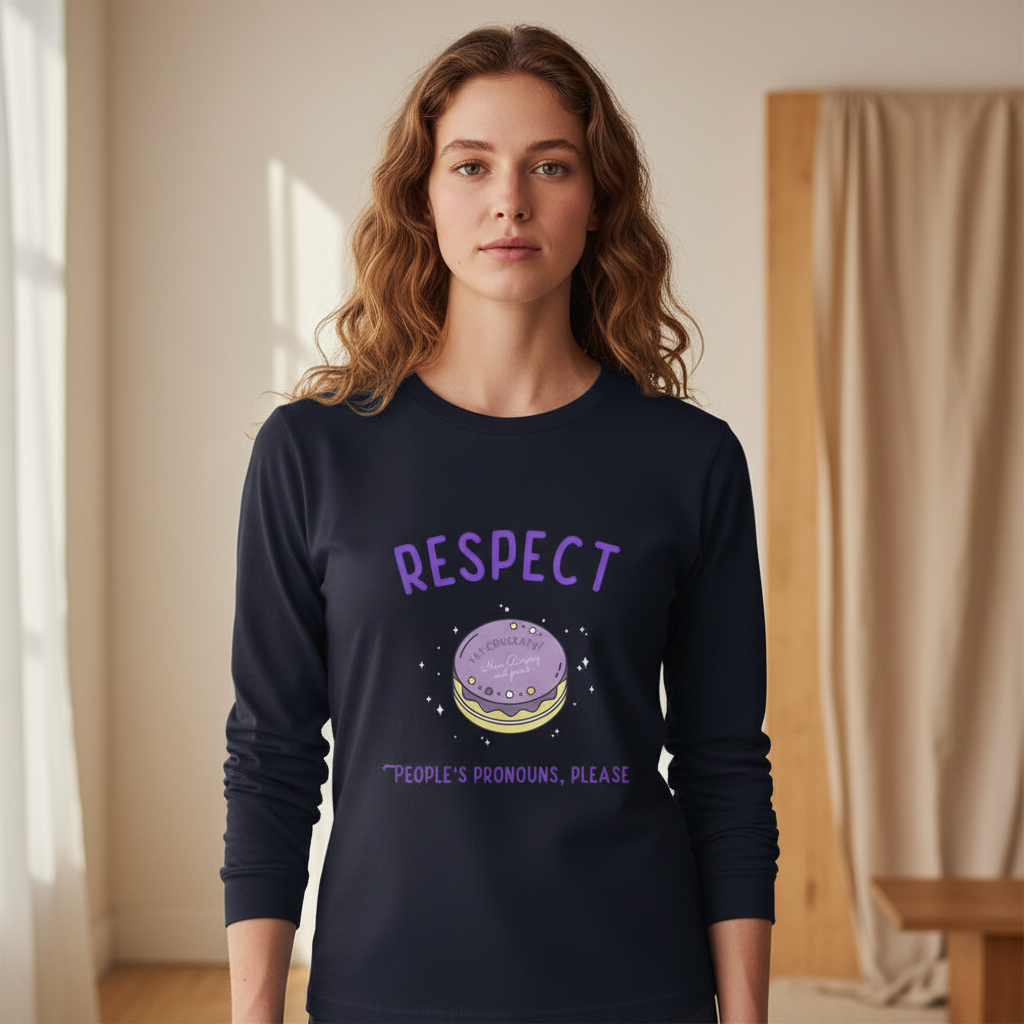 Model wearing the Respect People's Pronouns Please Unisex Long Sleeve T-Shirt, featuring RESPECT in purple, a playful planetary cookie graphic, and the inclusive message, People’s pronouns, please, embodying pride and self-expression.