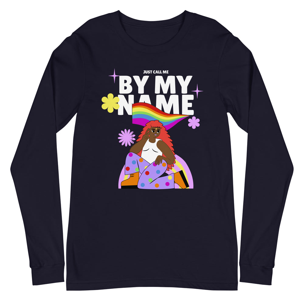 Front view of a black long-sleeve shirt reading “JUST CALL ME BY MY NAME,” with a rainbow and illustrated person