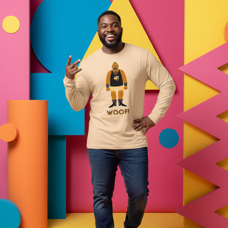 Smiling person models a beige long-sleeve shirt with a bear graphic and “WOOF!” text