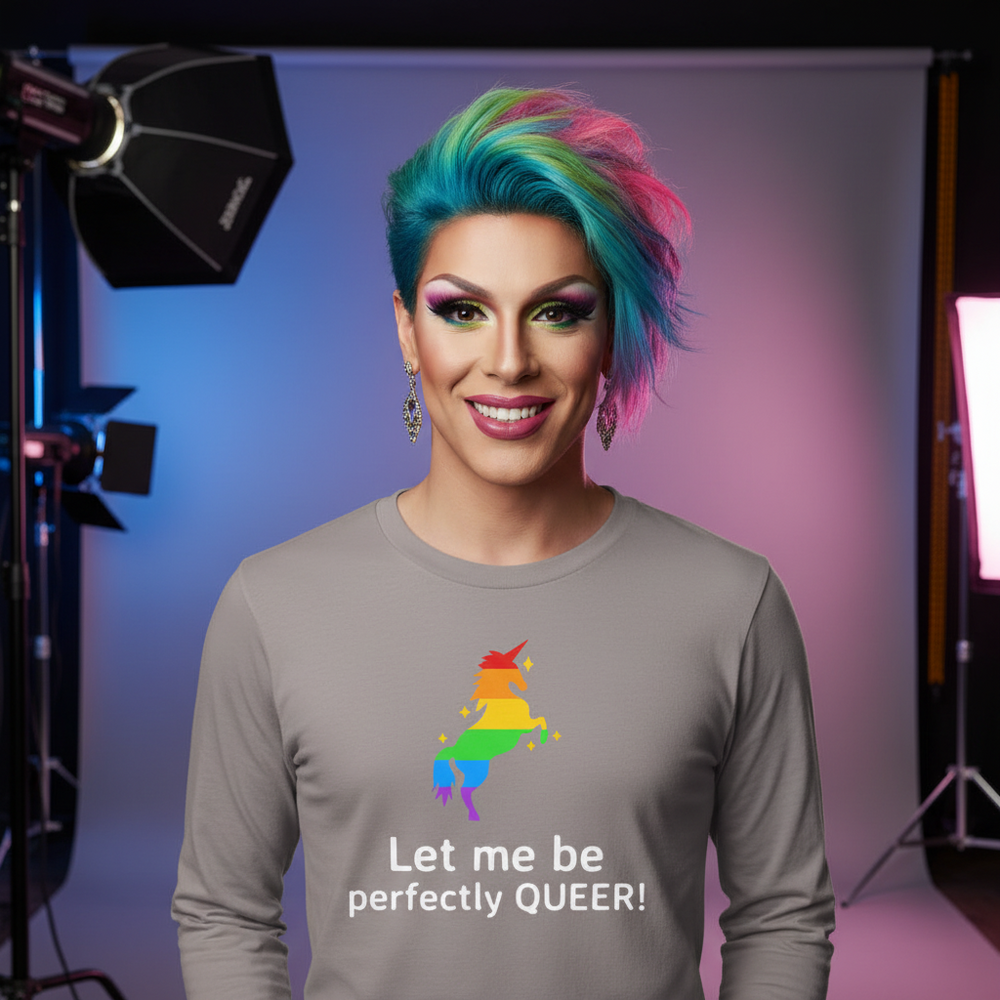 Smiling model in a gray long-sleeve shirt reading “Let me be perfectly QUEER!”