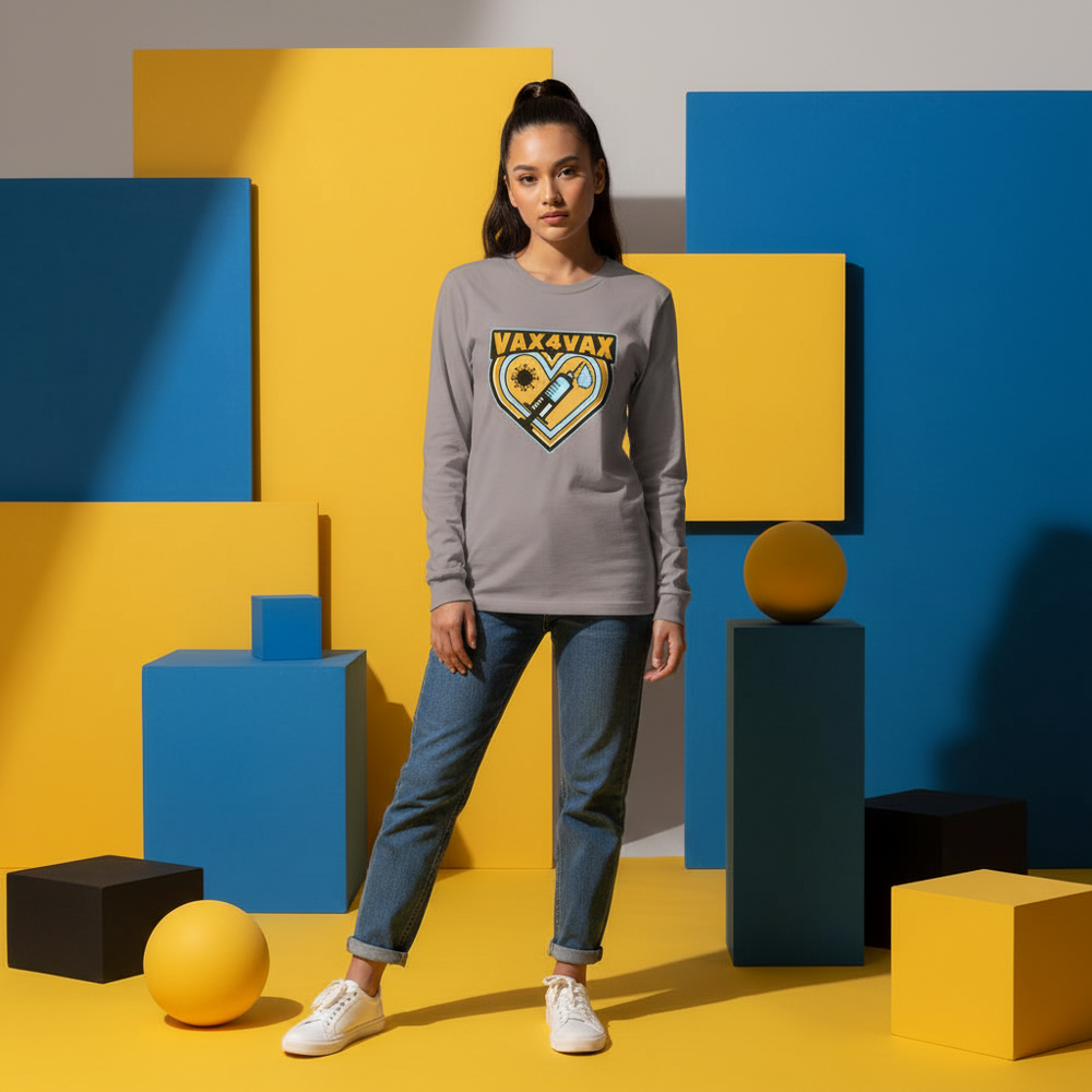 Model wearing a gray long-sleeve shirt with a VAX4VAX heart graphic, jeans, and sneakers