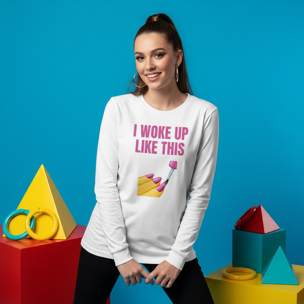 Person modeling a white long-sleeve shirt reading “I WOKE UP LIKE THIS” with a makeup graphic