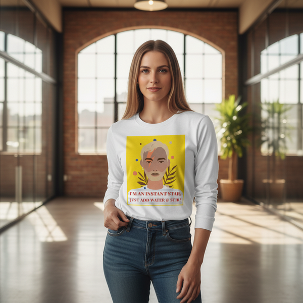 Front view of a person wearing a white long-sleeve shirt with a colorful portrait graphic and slogan