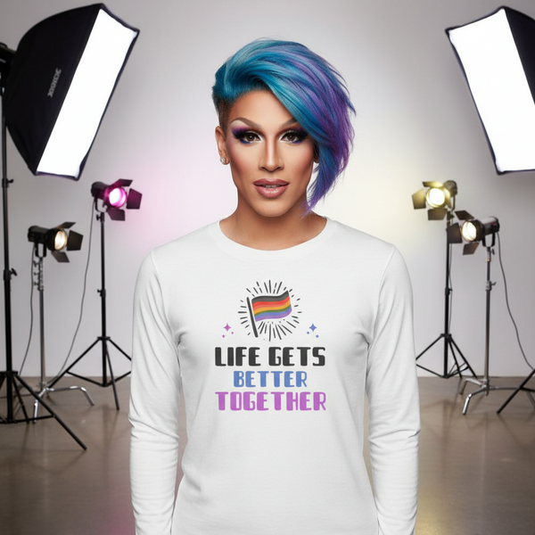 Model wearing a white long-sleeve shirt reading “LIFE GETS BETTER TOGETHER” with a rainbow flag graphic