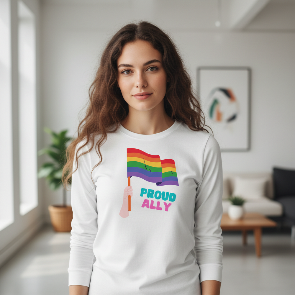 Front view of a model wearing a white long-sleeve shirt with rainbow flags and “PROUD ALLY” text