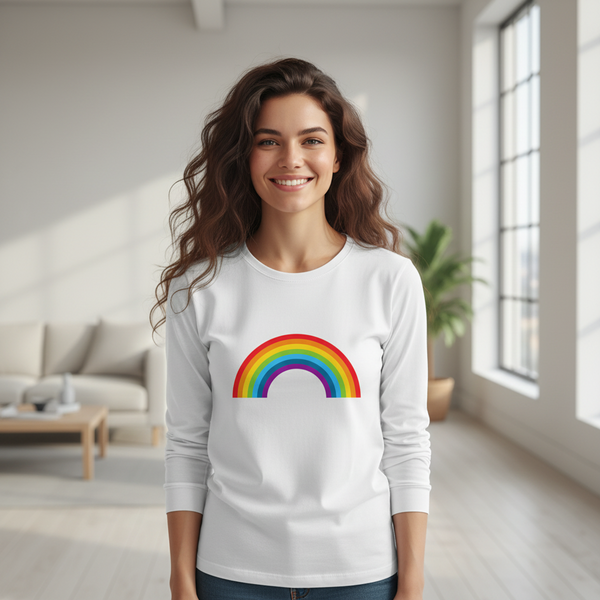Smiling model wearing a white long-sleeve shirt with a rainbow arch graphic