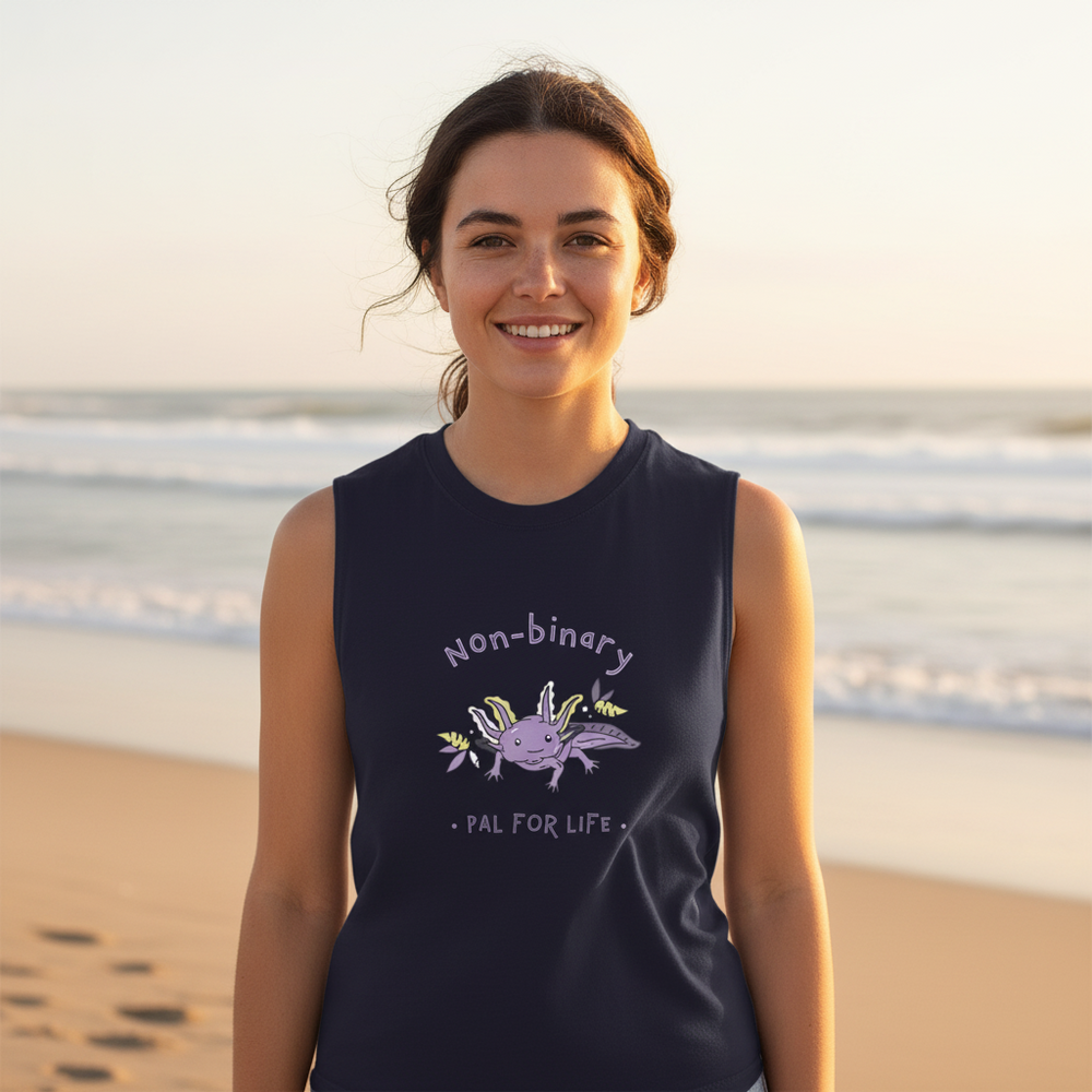 Non-Binary Pal For Life Muscle Top: navy tee, relaxed fit; purple axolotl and "Non-binary Pal for Life". Beach backdrop.