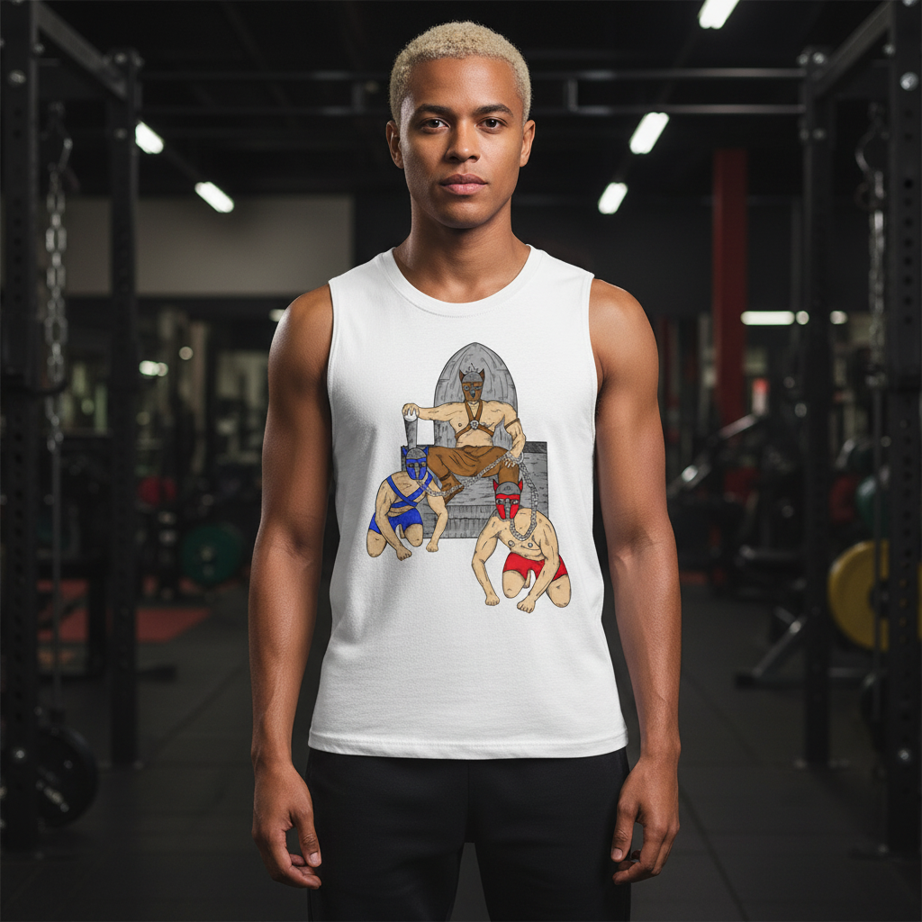 Pup Play Muscle Top with a throne and two masked wrestlers graphic, worn by a blond man in a gym with weights behind him.