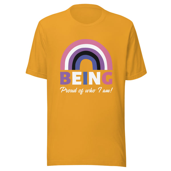 Mustard yellow tee with a pink, purple, and black rainbow over “BEING” and white script “Proud of who I am!”—queer pride style.