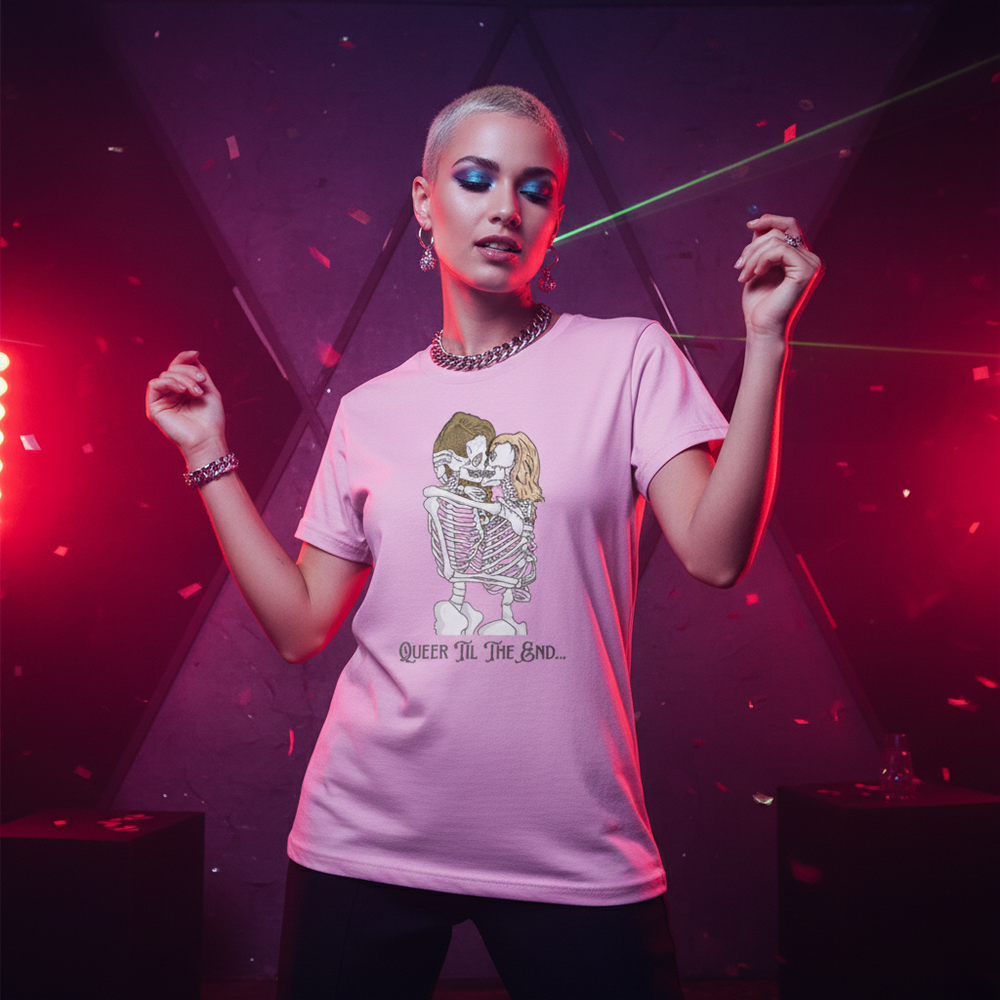 Pink unisex cotton Queer Til The End T-shirt with two embracing skeletons and "QUEER TIL THE END" slogan, in neon-lit club.