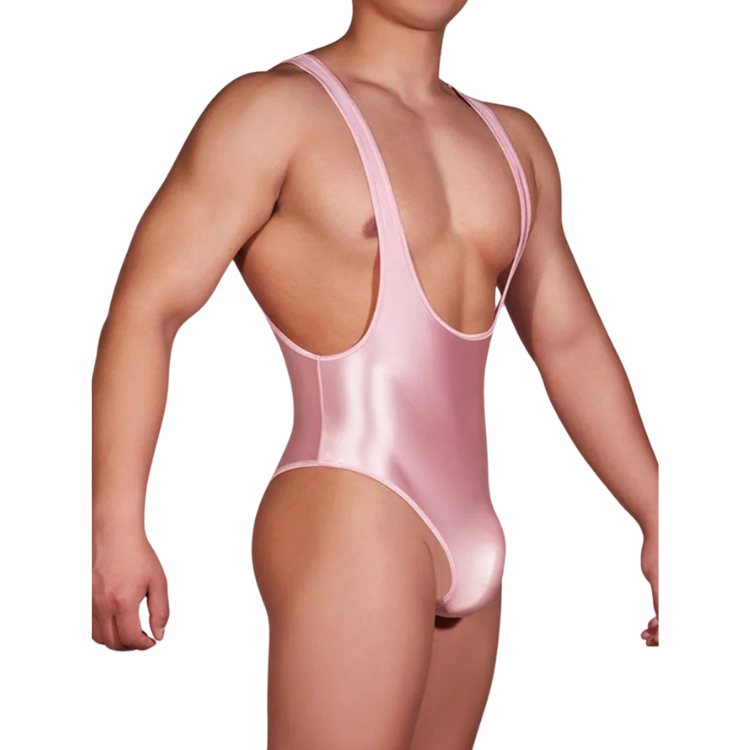 Front three-quarter view of a model in a shiny pink deep V-neck bodysuit