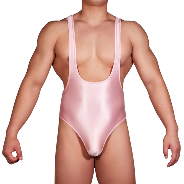 Front view of a person wearing a shiny light-pink, low-cut one-piece bodysuit
