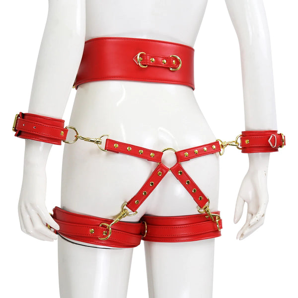 Front view of a red leather-style body harness with wrist and thigh cuffs on a mannequin