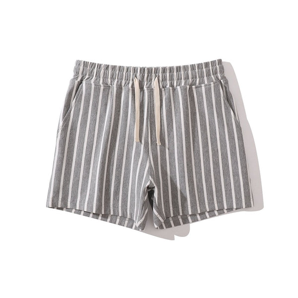 Gray slim-fit shorts with vertical white stripes, drawstring waist, and side pockets